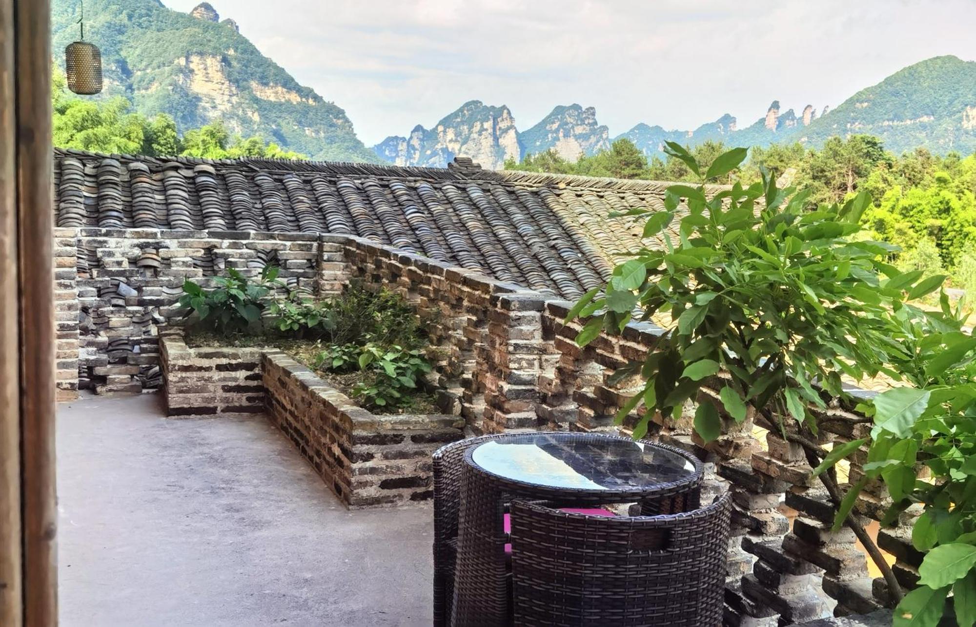Dayong Antique Feature Resort Zhangjiajie Exterior foto